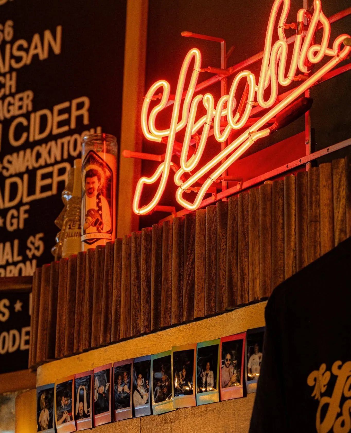 A glowing neon sign inside Last Chance Saloon